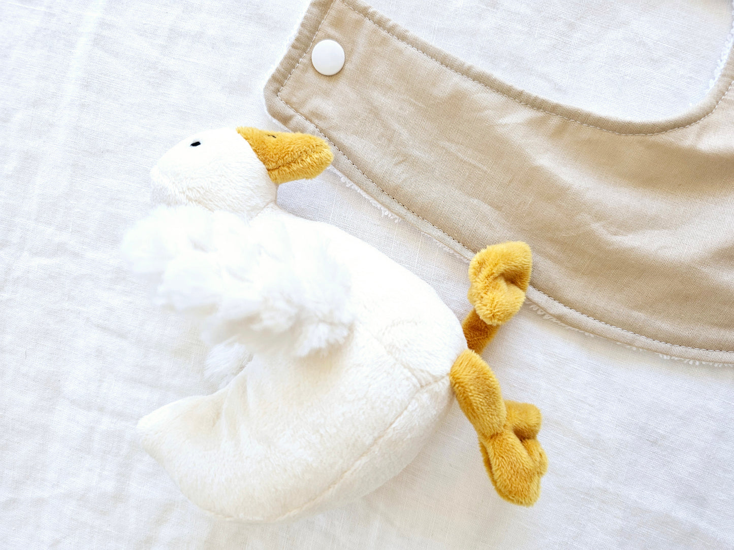 Beige dribble bib