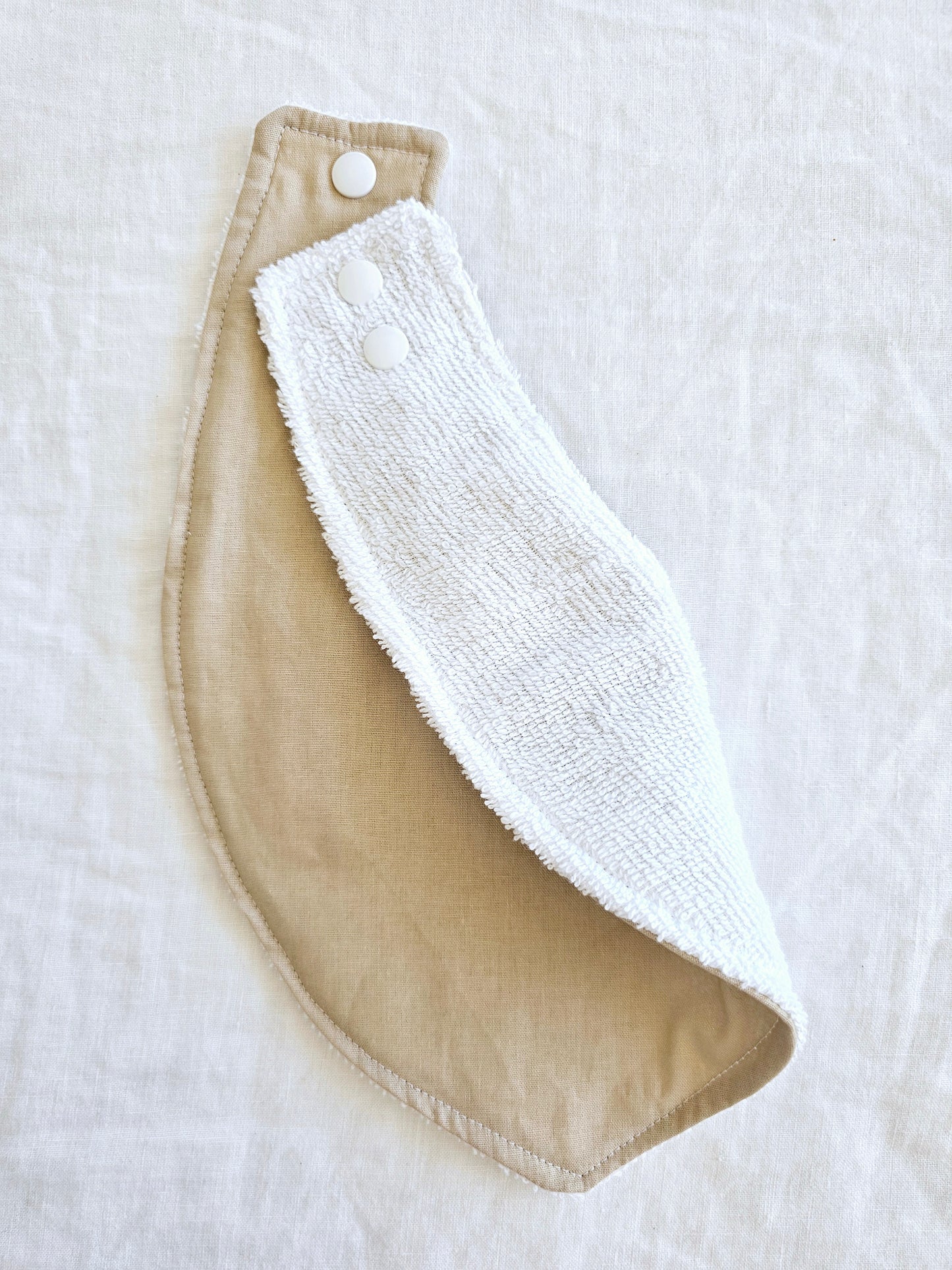 Beige dribble bib