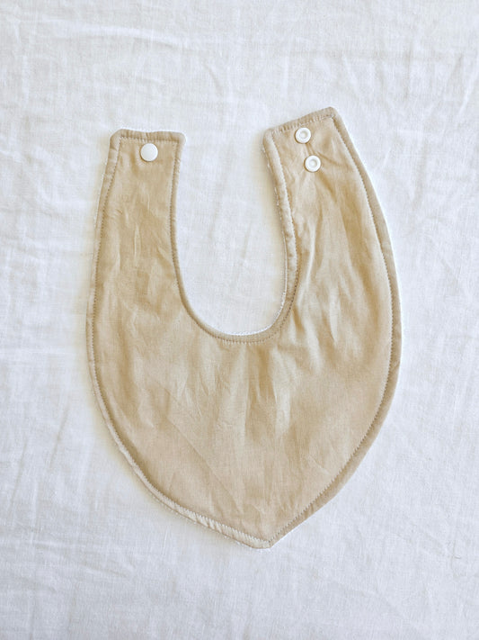 Beige dribble bib