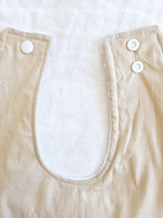 Beige dribble bib